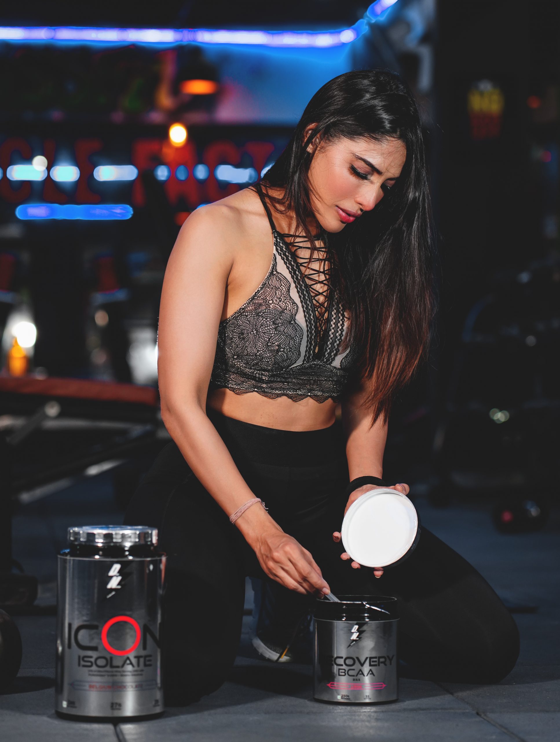 Female-fitness-model-showing-her-supplement-box-402056-pixahive